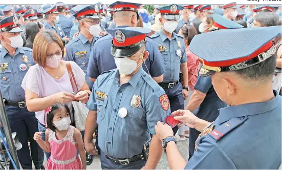  ?? PHOTOGRAPH BY JOEY SANCHEZ MENDOZA FOR THE DAILY TRIBUNE @tribunephl_joey ?? MANILA Police District director P/Brig. Gen. Andre Dizon leads the activities on the promotion of some police officers from the MPD Command on Tuesday.