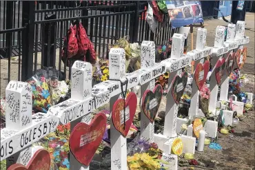  ??  ?? The memorial to the nine people killed in the Aug. 4 shooting in the Oregon District.