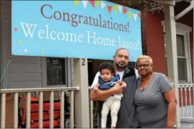  ?? MARIAN DENNIS — DIGITAL FIRST MEDIA ?? Jason Wright holds his daughter, Josie, as they stand next to his aunt, Janice Gilyard. Gilyard was reunited with Jason after he was adopted more than four decades ago.