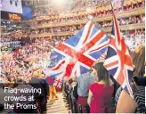  ??  ?? Flag-waving crowds at the Proms