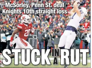  ?? AP ?? LION IN WAIT: As Rutgers’ Avery Young closes in, Penn State tight end Pat Freiermuth makes one of his two TD catches in the Nittany Lions’ 20-7 victory Saturday.