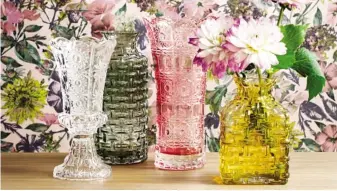  ??  ?? Iris Pressed Glass Vase, £15. Glass Vase, £25. Edem Pressed Glass Vase, £15. Rosemary Pressed Luna Pressed Glass Vase, £12. All from M&S