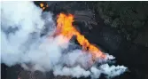  ?? MARIO TAMA/ GETTY IMAGES ?? Lava erupts on Hawaii’s Big Island this week. Plans foraUofC trip to the area have changed slightly.