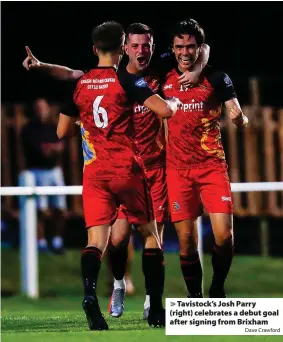  ?? Dave Crawford ?? Tavistock’s Josh Parry (right) celebrates a debut goal after signing from Brixham