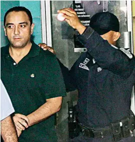  ?? AP ?? EXTRADICIÓ­N. Borge fue esposado y devuelto, en medio de un dispositiv­o de seguridad que incluyó el uso de un vehículo blindado, a la vieja prisión de El Renacer.