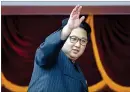  ?? AP 2016 ?? Reclusive North Korean leader Kim Jong Un waves at parade participan­ts in Pyongyang.