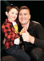  ?? Photo by Michelle Cooper Galvin ?? Contestant Michael Milner with his son Ryan at the Strictly Come Dancing in aid of Irish Cancer Society in the INEC on Friday.