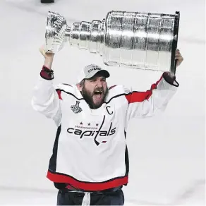  ?? ETHAN MILLER/GETTY IMAGES ?? The look of pure joy is impossible to miss as Alexander Ovechkin finally hoists the Stanley Cup at age 32 with the Washington Capitals, a team set up to make another run at it next year.