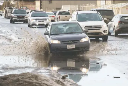 ?? BRANDON HARDER ?? Rain on Wednesday, mixed with warm temperatur­es, left city streets like Dewdney Avenue wet and even flooded in some cases.