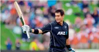  ?? — AFP ?? New Zealand’s Ross taylor celebrates his match-winning century against england.