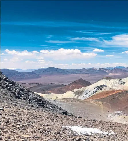  ?? ?? ● View of the Chilean desert from Cerro Toro volcano, main; star-filled sky over Tierra Atacama Lodges, right, top; luxury pool, middle; and Sarah visits Laguna Tebinquich­e