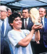  ??  ?? WORLD SUPERSTAR
Maradona helped Argentina to glory at Mexico 86 and then lifted Napoli to their first Serie A title in 1987