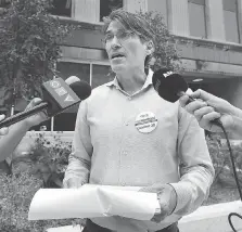  ?? DAN JANISSE ?? Windsor mayoral candidate Matt Marchand speaks to the media in front of the Enwin Utilities office on Ouellette Avenue on Thursday.