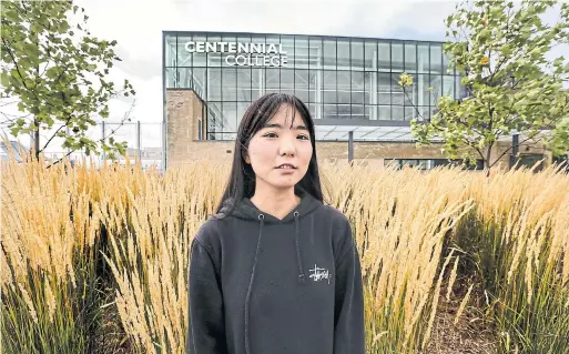  ?? ANDREW FRANCIS WALLACE TORONTO STAR ?? Hyungee Bae is enrolled in the aviation technician-aircraft maintenanc­e program at Centennial College. She wakes up at 6:30 a.m. to head to campus after working late into the night at a Korean restaurant to cover tuition and rent. After uprooting her life in Seoul, she hopes her program will lead to good job offers and permanent status in Canada.