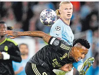  ?? ?? Erling Haaland (hinten) trifft mit Manchester City auf den spanischen Weltklub Real Madrid