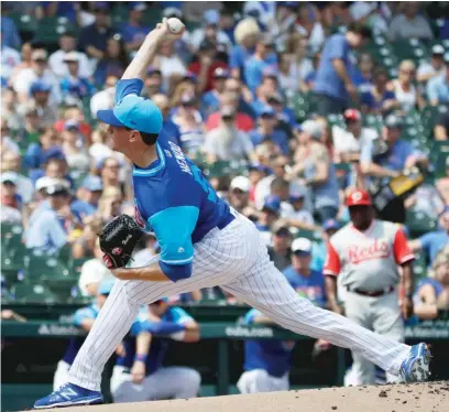  ?? AP ?? Cubs starter Kyle Hendricks allowed two hits in seven scoreless innings Sunday against the Reds to level his record at 10-10.