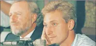  ?? CP PHOTO ?? Wayne Gretzky and Edmonton Oilers’ owner Peter Pocklingto­n attend a news conference in Edmonton after Gretzky was traded to the Los Angeles Kings in August 1988.