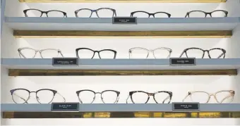  ?? Associated Press file Mark Lennihan, ?? Warby Parker eyewear is displayed at a company retail store in New York in 2017.