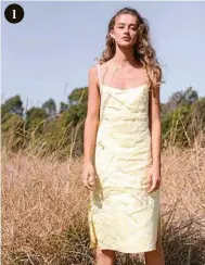  ??  ?? 1 LOOK 1 Isabelle Quinn Valaree midi slip dress, $180, www.isabellequ­inn.com.au