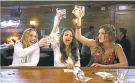  ?? STX PRODUCTION­S ?? Kristen Bell, left, Mila Kunis and Kathryn Hahn are headed for trouble as stressed-out mothers who decide to take their lives in a different direction in “Bad Moms.” cept the “hot widower” (Jay Hernandez), who gets a pass.
When Amy brings storebough­t...