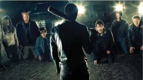  ?? AMC ?? Jeffrey Dean Morgan plays Negan, centre, with his dreaded bat, Lucille, in The Walking Dead, which kicks off a new season tonight.