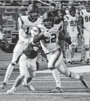  ?? Kirk Sides / Staff photograph­er ?? Shadow Creek's Marquez Huland (22) rushed for 161 yards on 14 carries and had a 75-yard touchdown run against Friendswoo­d on Friday night.