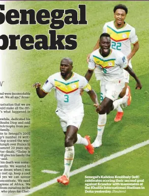  ?? (Reuters) ?? Senegal’s Kalidou Koulibaly (left) celebrates scoring their second goal against Ecuador with teammates at the Khalifa Internatio­nal Stadium in Doha yesterday.