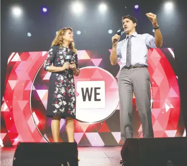  ?? MONICA SCHIPPER / GETTY IMAGES FILES FOR WE DAY ?? Sophie Grégoire Trudeau and Prime Minister Justin Trudeau speak on stage at the WE Day UN
gathering at Madison Square Garden in September 2017 in New York City.