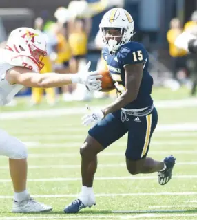  ?? STAFF PHOTO BY ROBIN RUDD ?? UTC's Kam Brown returns an intercepti­on during Saturday's home game against Virginia Military Institute. UTC won 41-13 to improve to 5-1 overall and 3-0 in the SoCon, and now the Mocs turn their attention to this week's matchup with Mercer (6-1, 4-0) at Finley Stadium.