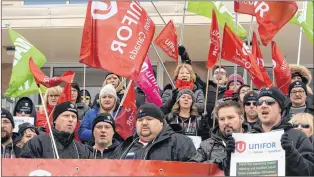  ?? JOE GIBBONS/THE TELEGRAM ?? Locked-out Unifor members who have been locked out by D-J Composites in Gander are joined by fellow Unifor and other union supporters at a rally Tuesday on the steps of the Confederat­ion Building in St. John’s.