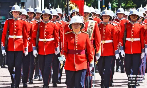  ??  ?? Captain Megan Couto (centre) led the Queen’s Guard in June.