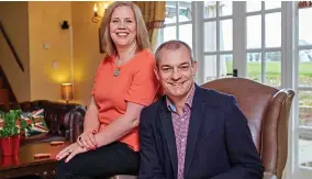  ??  ?? Tech tutor: Franchisee Andrew Green and his wife Stephanie