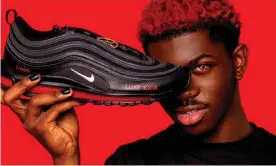  ??  ?? The modified Nike trainers, which feature a drop of human blood and a pentagram charm, sold for more than $1,000 (£740) a pair. Photograph: MSCHF