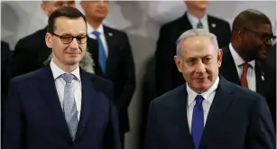  ?? (Kacper Pempel/Reuters) ?? POLAND’S PRIME MINISTER Mateusz Morawiecki and Prime Minister Benjamin Netanyahu attend the Middle East summit in Warsaw last week.