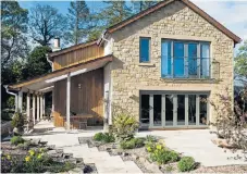  ??  ?? YOU BEAUTY: The Olivers’ house has a run of bifold doors