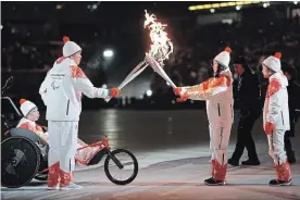  ?? CHANG W. LEE
NYT ?? The opening ceremony of the biggest Winter Paralympic­s yet unfolded Friday night with a glittering performanc­e that championed a world of coexistenc­e.