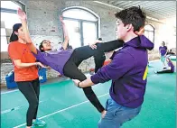  ?? PHOTOS BY ASSOCIATED PRESS ?? Teenagers work on acrobatic acts like balancing and juggling during a workshop at the Trenton Circus Squad.