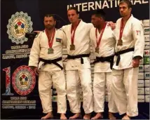  ?? (Photos DR) ?? Le podium du mondial mexicain, dominé par le champion londais Kévin Czernik en partant de la gauche).