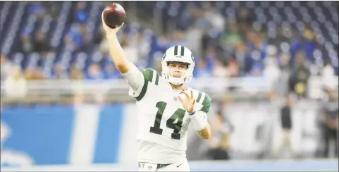  ?? Jose Juarez / Associated Press ?? New York Jets quarterbac­k Sam Darnold throws during the second half against the Detroit Lions in Detroit on Monday.