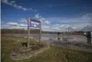  ?? ?? A flooded baseball field in Milton, West Virginia, in March. Flooding is increasing­ly common in the state. Photograph: Ryan Fischer/AP