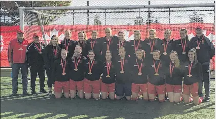  ?? SUBMITTED/NL SOCCER ASSOCIATIO­N ?? Members of the Holy Cross Avalon Ford soccer team pose with the bronze medals they won at the Jubilee Trophy national tournament in Surrey, B.C., on Monday. It’s the first-ever medal finish by a Newfoundla­nd and Labrador team at a Canadian senior...