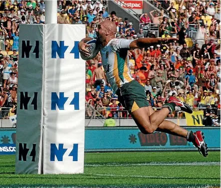  ??  ?? Ashley Drake scores a try for the Cook Islands at the Wellington Sevens. Drake, now the H-K sevens coach, is hoping to find new stars for his team.