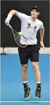  ??  ?? MELBOURNE: Andy Murray of Britain hits a return during a practice session ahead of the Australian Open tennis tournament in Melbourne yesterday. — AFP