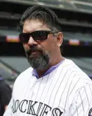  ?? David Zalubowski, The Associated Press ?? Former first baseman Todd Helton has rejoined the team and will work with minor leaguers.