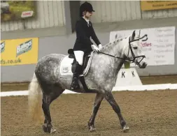  ??  ?? Rowan Crosby takes the grade I silver title with Kilimazing Tiger Lily