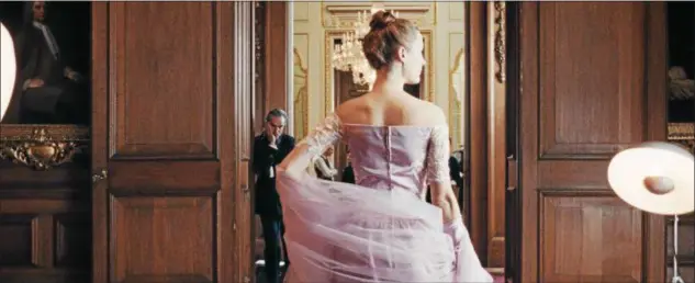  ?? FOCUS FEATURES ?? Daniel Day-Lewis stars as a dressmaker, and Vicky Krieps is his muse in “Phantom Thread.”