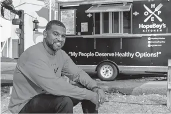  ?? Photos by Elias Valverde II/Tribune News Service ?? HopeBoy’s Kitchen owner Rico Alexander lives now in Grand Prairie but parks his his food truck in southern Dallas, where he says he’s trying to do good and live down his criminal past.