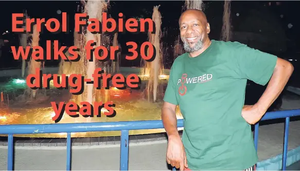  ?? PHOTO BY MEL COOKE ?? Errol Fabien at Emancipati­on Park, New Kingston, on Thursday night after walking from the UWI, Mona, as part of his Walk2Freed­om in 15 countries to celebrate being drug free for 30 years.