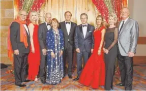  ??  ?? Dr. Michael Salem (center, National Jewish Health president and CEO) with grand marshals Michael Schonbrun and Susan Juroe, Jack and Gail Klapper, Mike and Michelle Fries, and Karen and Michael Long.