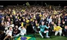  ?? Getty Images ?? Central Coast Mariners celebrate the team’s win with fans and their first grand final since 2013. Photograph: Scott Gardiner/